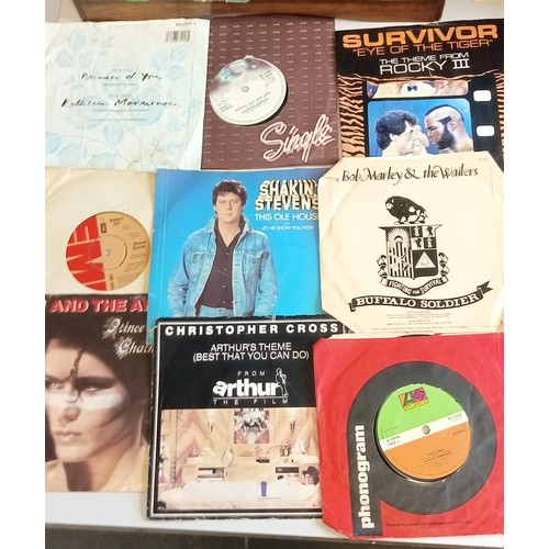 63 - Large selection of 45 RPM singles