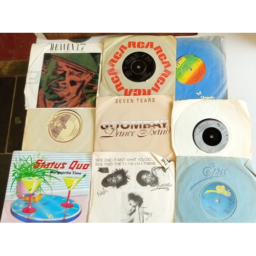 63 - Large selection of 45 RPM singles