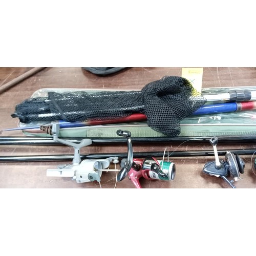 356 - Selection of fishing equipment to include rods, reels, net and stand