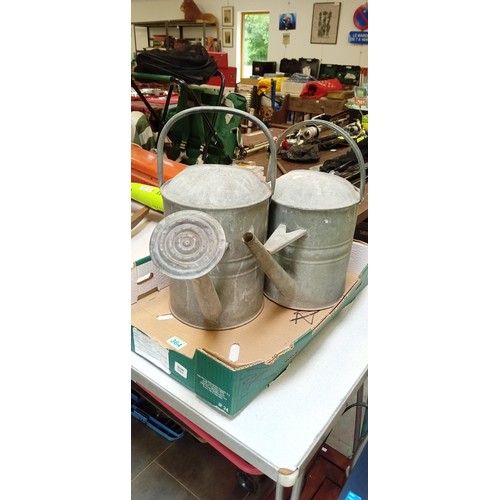 364 - 2 metal watering cans