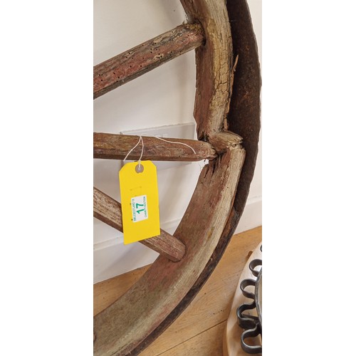 17 - Antique wooden and metal cartwheel