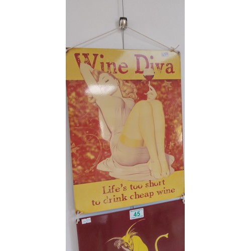 45 - Pair of metal wall hangings 'Wine Diva & Maurin Quine'