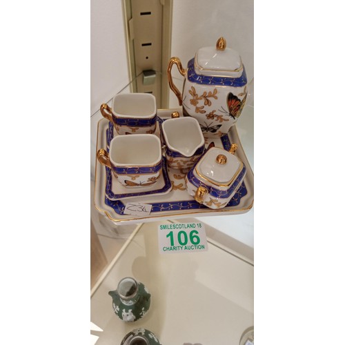 106 - The House of Valentina miniature tea set