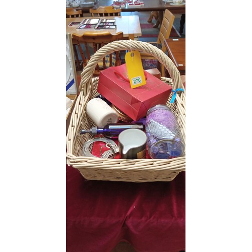 276 - Basket full of mixed items which has been donated to the charity