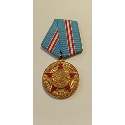 16 - Selection of Russian medals and badges