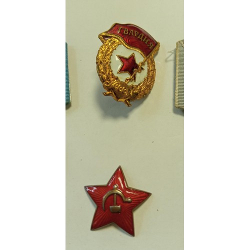 16 - Selection of Russian medals and badges