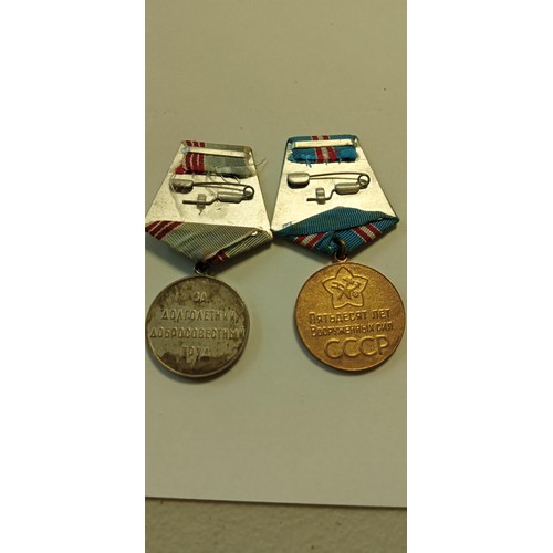 16 - Selection of Russian medals and badges