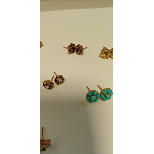 38 - 9 Pairs of 9ct gold earrings total weight without butterflies 8.8g approx. Butterflies unchecked