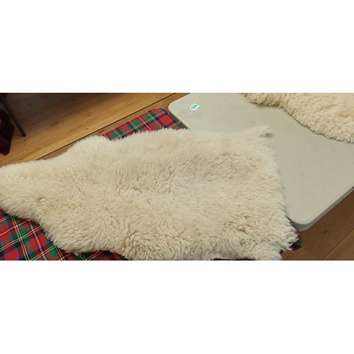 524 - Small sheepskin rug measures 1m long approx