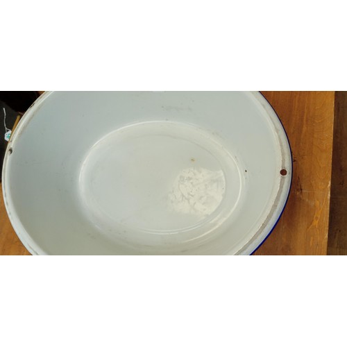 561 - Large enamel oval white and blue basin