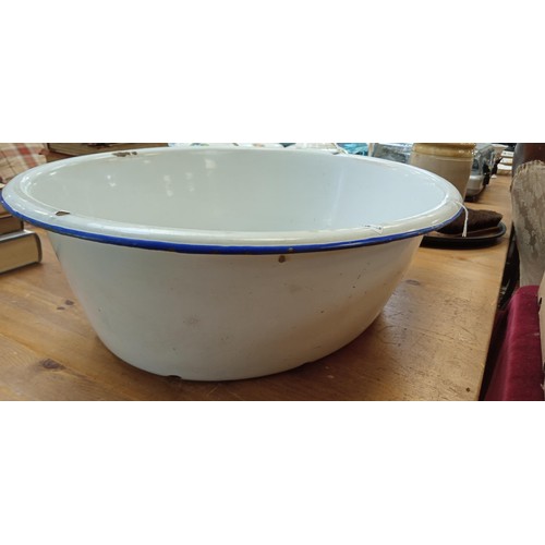 561 - Large enamel oval white and blue basin