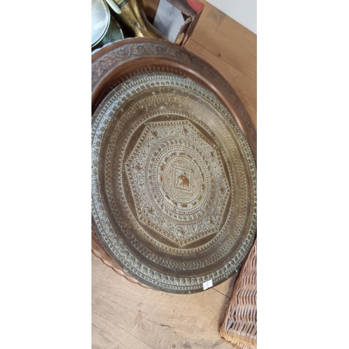 31 - Good selection of brass to include trays, vases and more