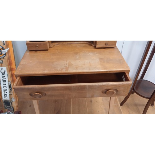 81 - Ercol writing table 1970's solid elm with gallery and frieze drawer