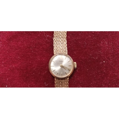 87 - Stamped 9ct gold 1960's ladies watch in original box weighs 17.7g approx. Both clasps hallmarked