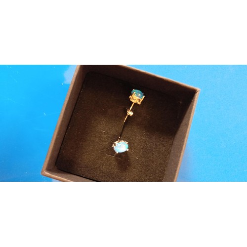 116 - A boxed pair of Opal Earrings