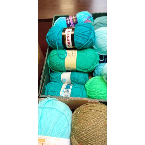 380 - 2 boxes of blue and green wool