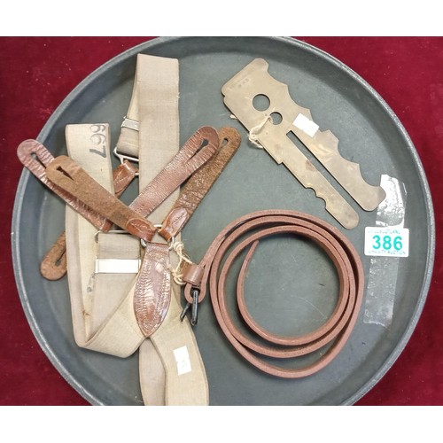 386 - Tray of military braces, belt & brass button shiner