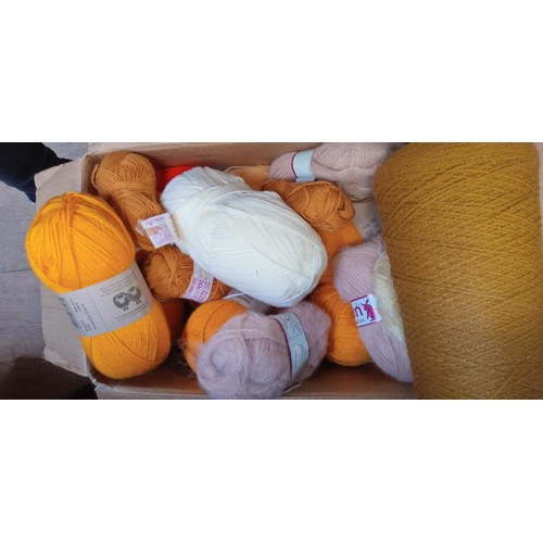 388 - Large box of mainly yellow and orange coloured wool