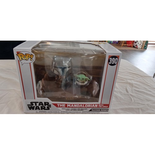 5 - Funko Pop/ bobble head Star Wars #390 The Mandalorian with the child brand new never opened