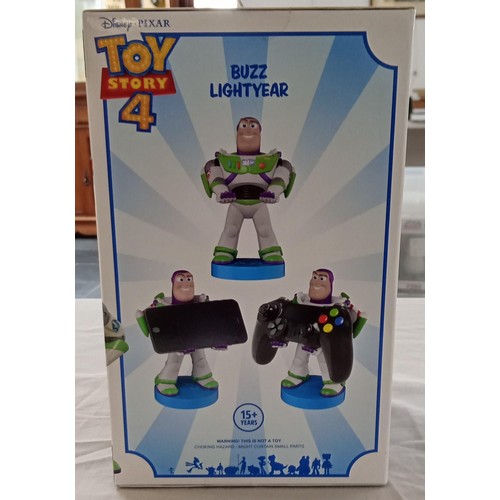 49 - Disney Toy Story 4 Buzz Lightyear phone & game controller holder with USB charger