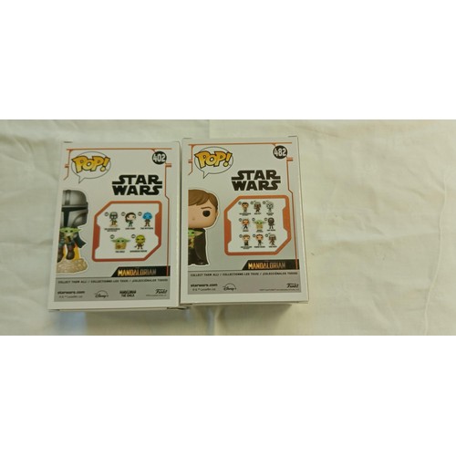 57 - Funko Pop/ bobble head Star Wars #402 & #482 The Mandalorian with the child plus Luke Skywalker with... 