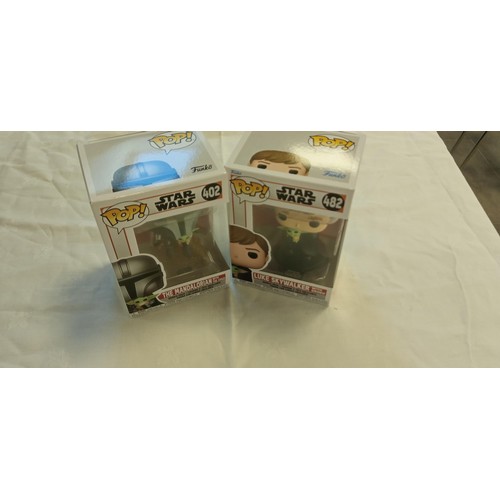 57 - Funko Pop/ bobble head Star Wars #402 & #482 The Mandalorian with the child plus Luke Skywalker with... 