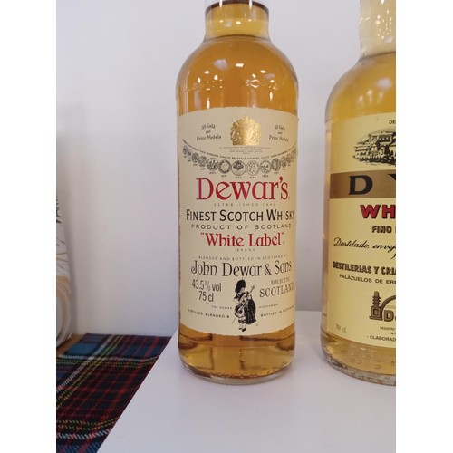 24 - 3 bottles of whisky Dewar's, White Label 75cl 43.5 vol, DYC whisky Fino blended 70 cl 40 vol & Alway... 