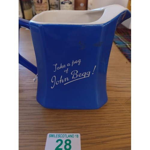 28 - John Begg whisky jug