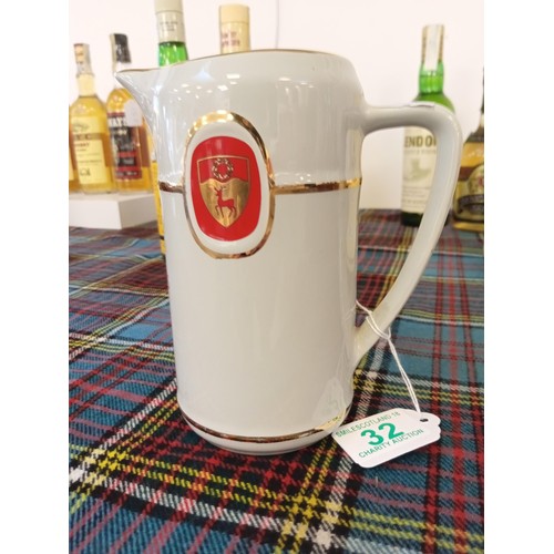 32 - Mackinlay's scotch whisky jug