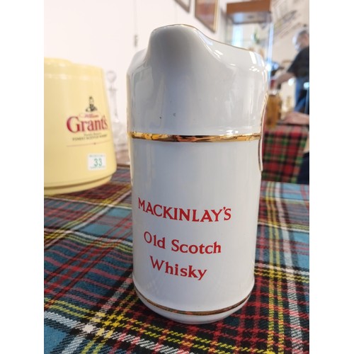 32 - Mackinlay's scotch whisky jug