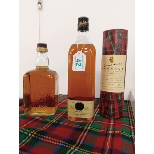 42 - 3 bottles of whisky Meikles reserve scotch whisky 35cl 40 vol, House of Lords whisky with no label 8... 