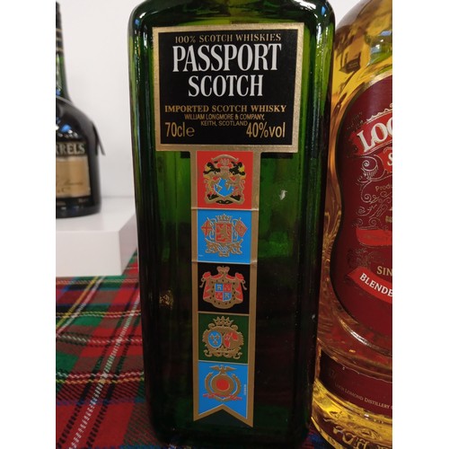 50 - Passport Scotch whisky 40 vol 70cl & Loch Lomond single blend 0.7L 40 vol