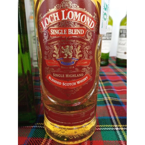 50 - Passport Scotch whisky 40 vol 70cl & Loch Lomond single blend 0.7L 40 vol