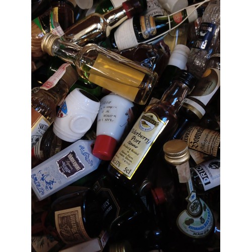 55 - Large selection of miniatures to include liqueurs, Peach Schnapps and various alcohol and different ... 