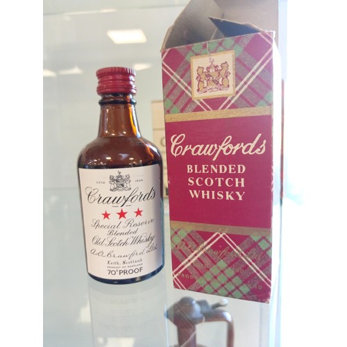 64 - Queen Anne 70 proof, Crawfords 70 proof miniatures both in tartan boxes & Glamis Castle reserve 12 y... 