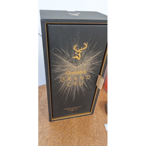 76 - Glenfiddich Grand Cru empty bottle (cost £320 full) and case plus other cases and Players Medium Nav... 