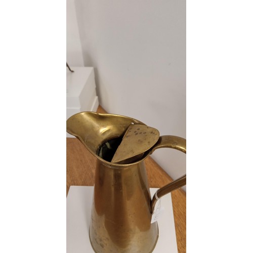 82 - Brass lidded quartz jug