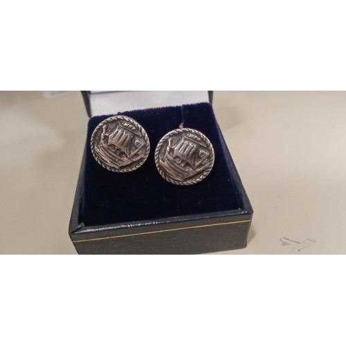 106 - Shetland stamped silver cufflinks showing Viking ship