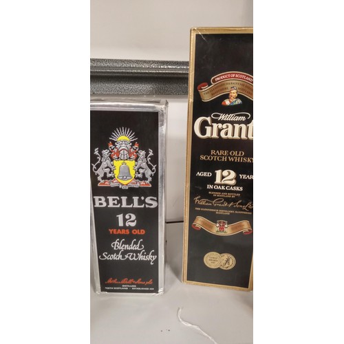 193 - Bells 12 year bottled blended scotch whisky in original box 75cl 40 vol plus William Grants 12 year ... 