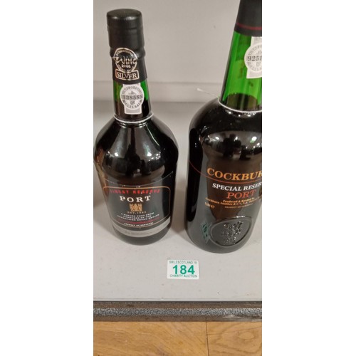 184 - 1L bottle Cockburns port and Marks & Spencers finest port