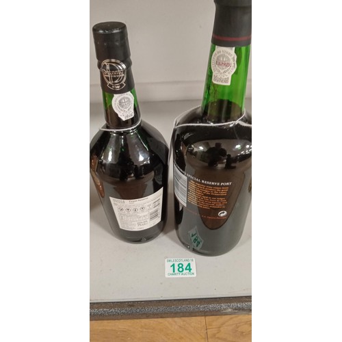 184 - 1L bottle Cockburns port and Marks & Spencers finest port