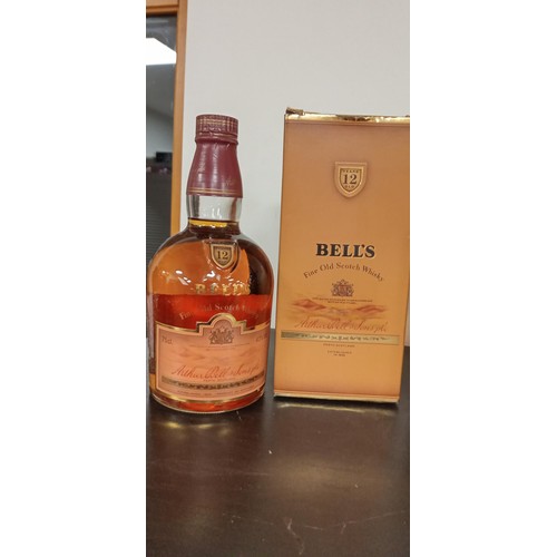 165 - 3 bottles 12 year old Bells whisky 75cl 43 vol, Ballantines 12 year old Old Scotch whisky 75cl & Joh... 