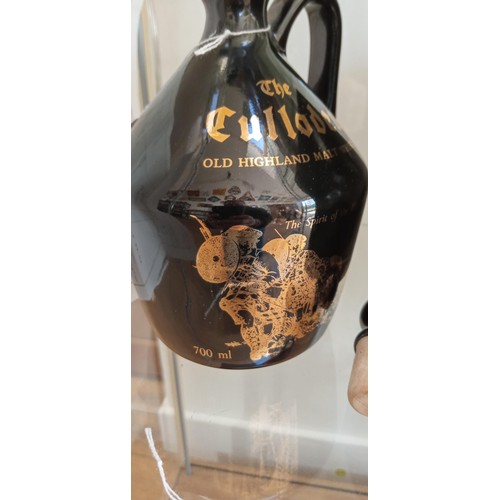 135 - The Culloden Old highland malt whisky flagon spirit of the highland clans in original box sealed wit... 