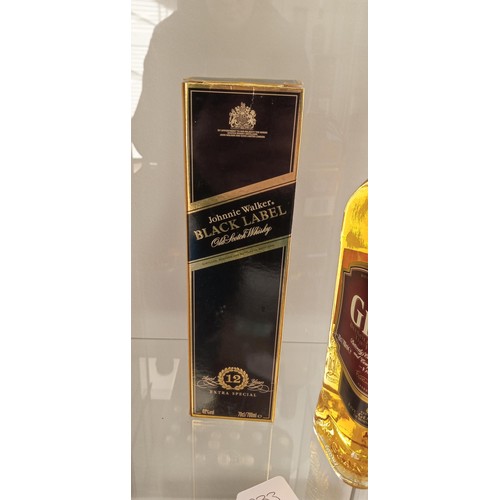 162 - Grants scotch whisky 70cl 40 vol, Johnny Walker Black label 40vol 70cl & Vintage sealed 12 year old ... 