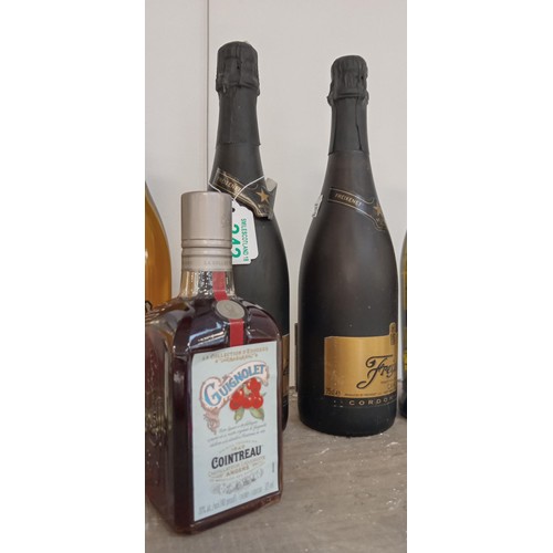 242 - Selection of wine, Bacardi original orange rum 35 vol 1L, Cointreau & Freixenet Cava