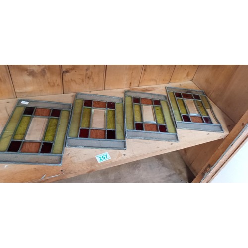 257 - 4 vintage small stained glass windowpanes slight damage to one