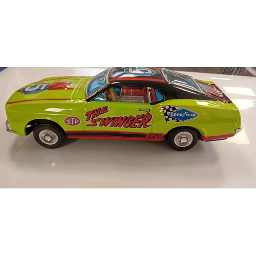 271 - The Swinger made in Japan metal 1960's battery operated car in its original box in immaculate condit... 