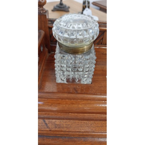 22 - Antique oak ink well desk stand with two cut glass brass topped ink wells