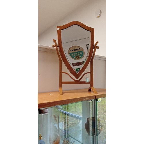 127 - Shield shape tabletop mirror with stand