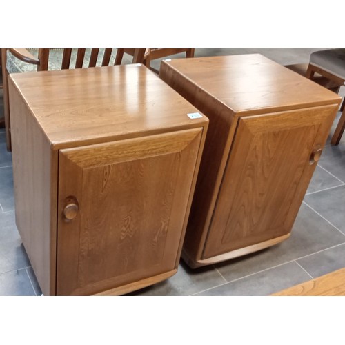 253 - A pair of Ercol Windsor hall/ bedside cabinets